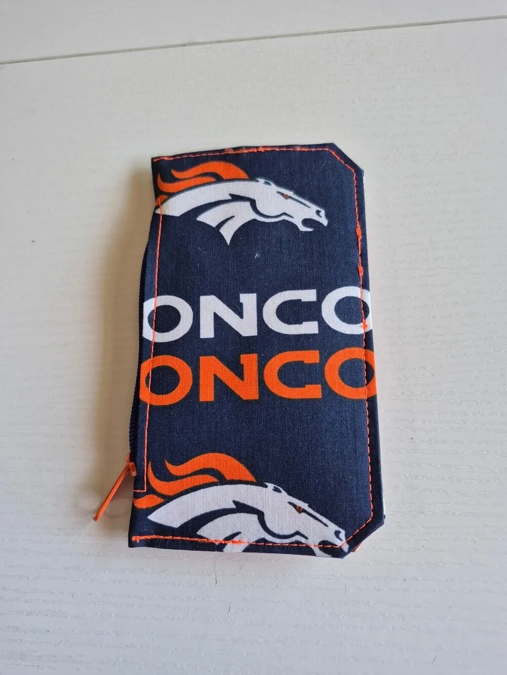 football wallet orange and blue magnetic snap tab 6 card slot wallet